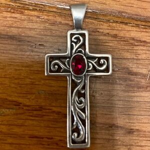 Sterling silver cross pendant with red stone